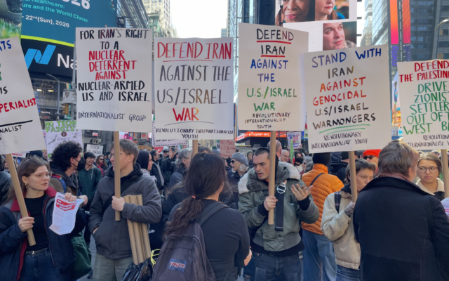 Pro-Iran protesters, in Times Square, New York City, February 28, 2026. (Luke Tress/Times of Israel)